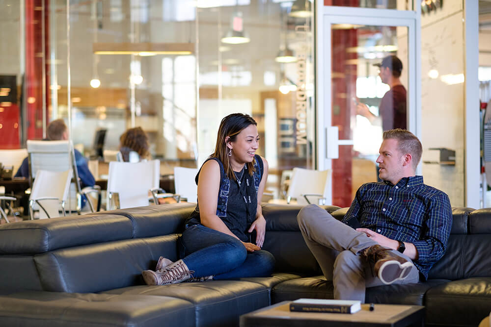 team members sitting around their desks