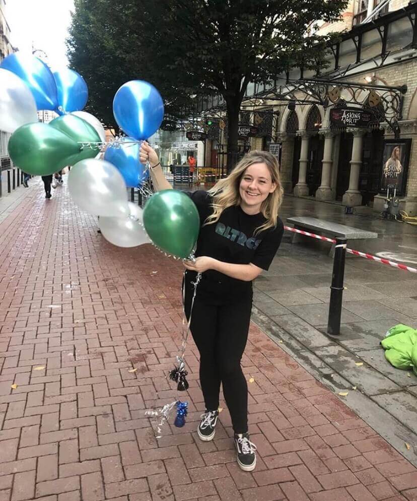 Emma, senior account executive, helping to prepare for an on-site event at the Dublin HQ