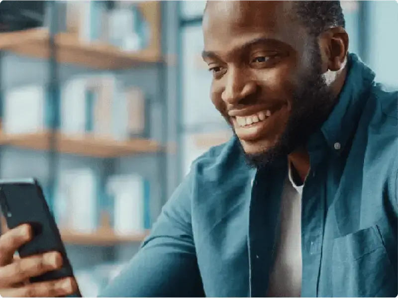 man smiling on phone