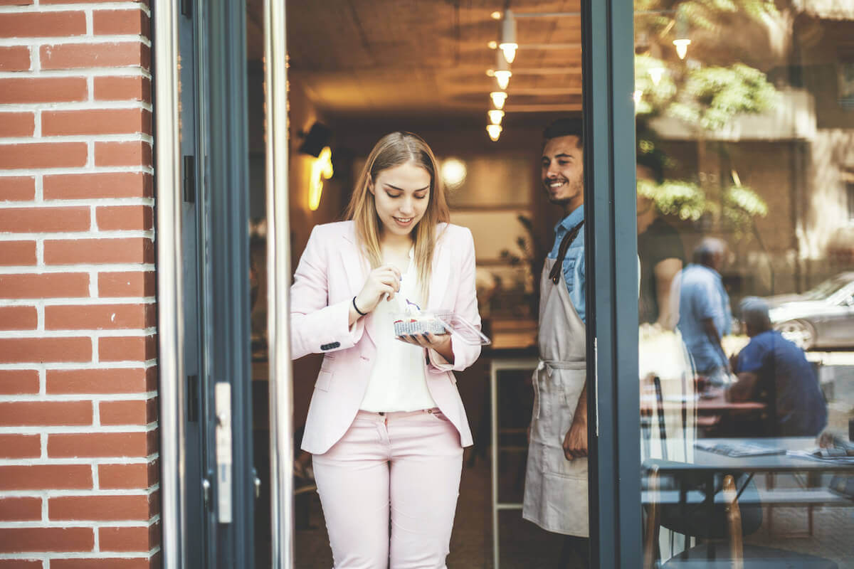 customer happy churn qualtrics istock