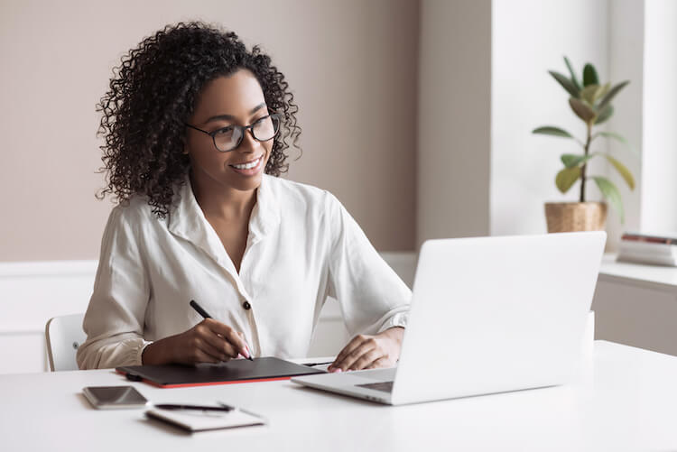 woman working from home - hybrid work