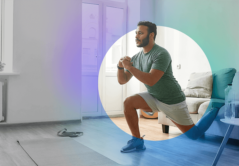 Image of man working out in living room