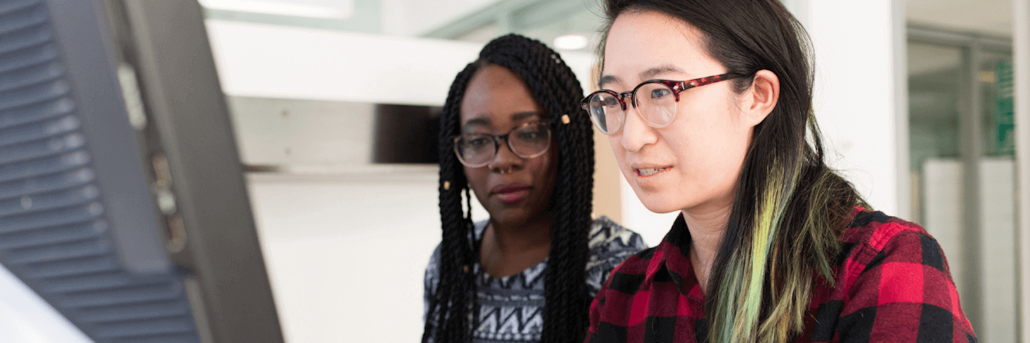 Two women collaborating on a project