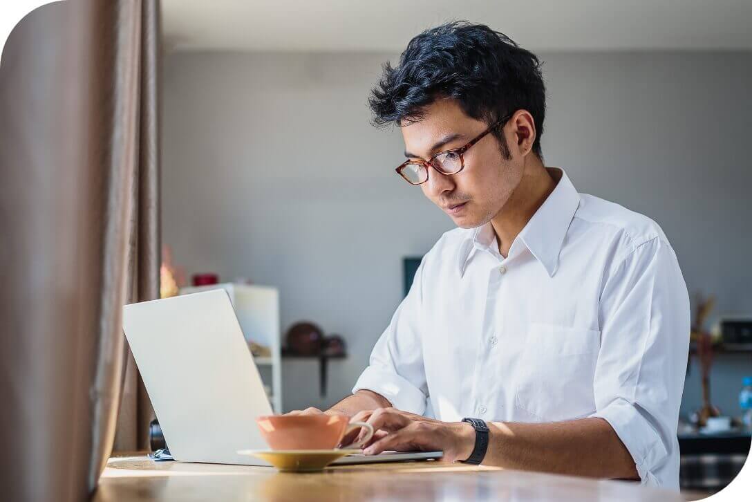 Image of man working on laptop