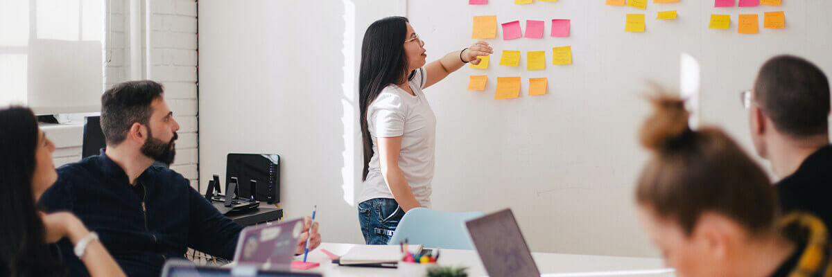 Woman leading discussion about research design