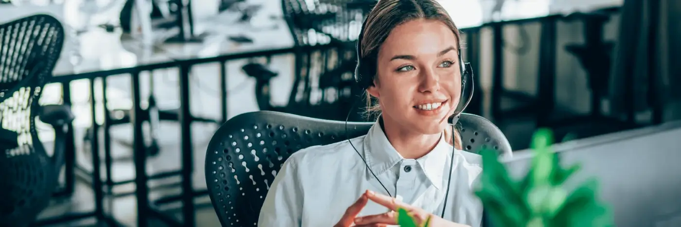 girl with headset on at work