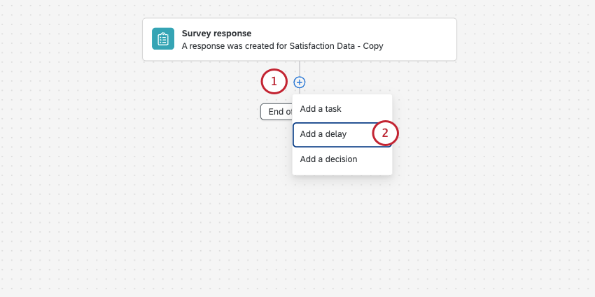 clicking the plus sign to add a delay