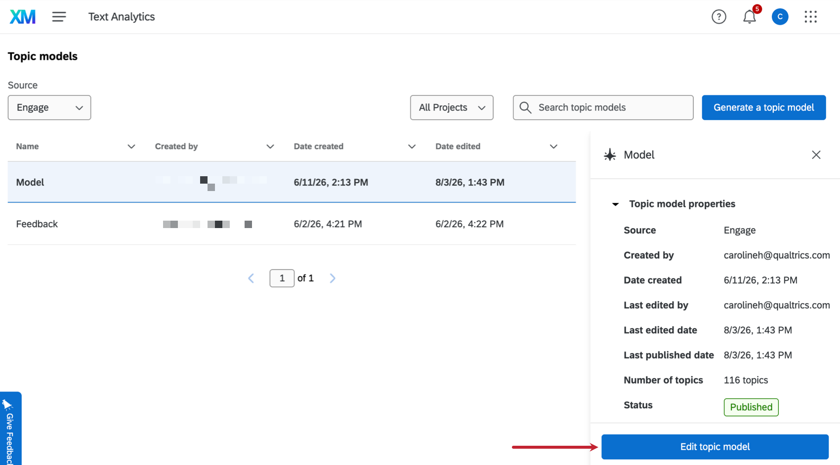arrow pointing to the "edit topic model" button at the bottom right of the topic models page