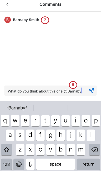 Showing how the @ mention makes a list of users appear at the top, which have to be clicked