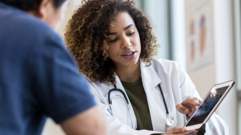 Healthcare worker working with a patient