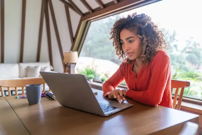 Woman working from her laptop indoors