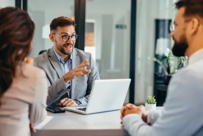 Group of business people talking in an office
