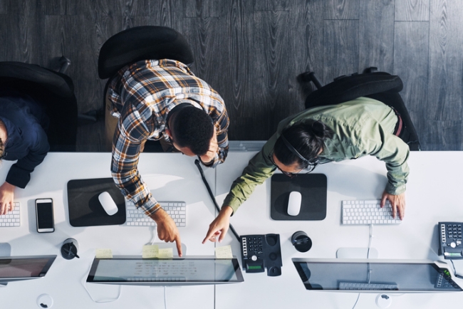 High angle shot of a group of call centre agents working in an office.