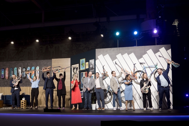 BTA winners receiving their guitars on stage