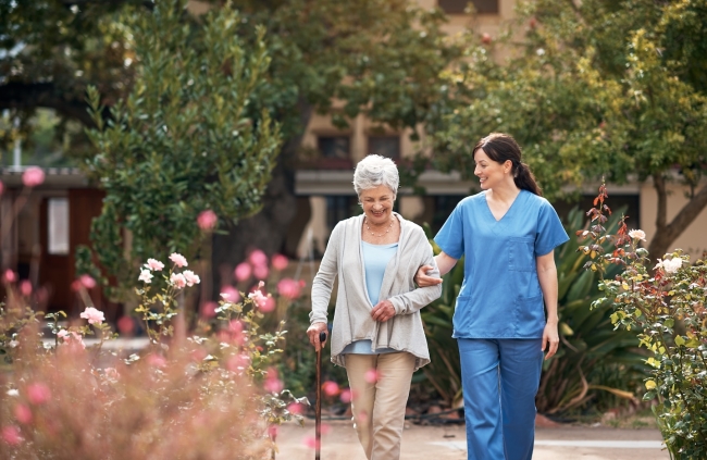Healthcare worker assisting a patient
