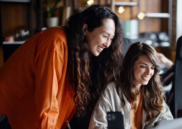 2 UX professionals planning the user journey.