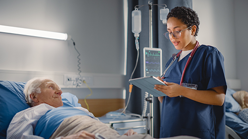 Nurse with an Ipad and patient