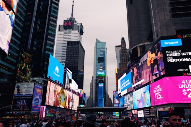 Brands advertising in Times Square in New York City during the summertime..