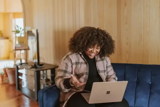 Woman recording video feedback as part of qualitative research.