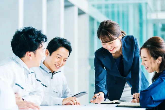 Woman presenting to peers