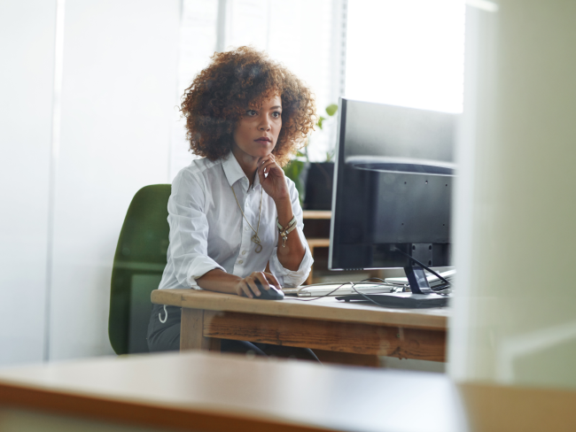 Woman looking at computer