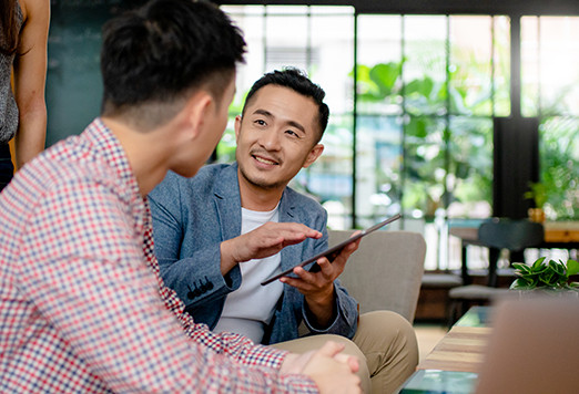 Customer experience team members discussing strategy
