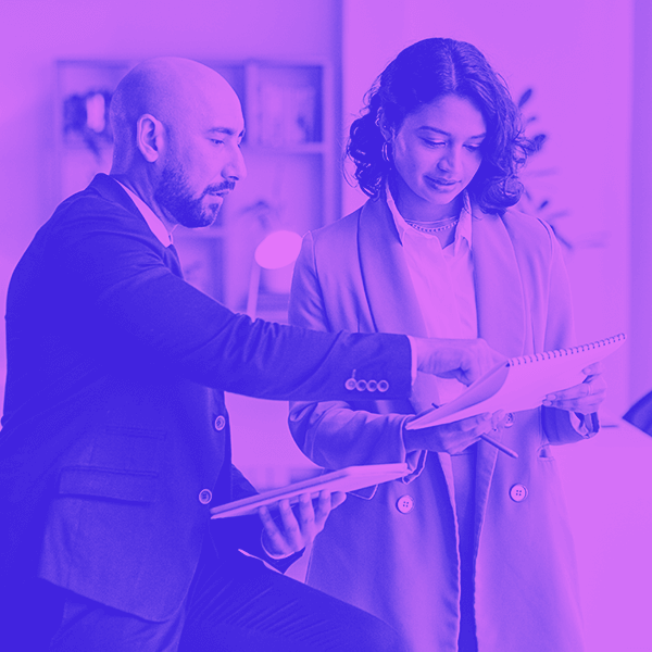 Manager and employee reviewing data
