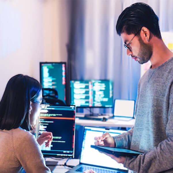 Two researchers working on AI data