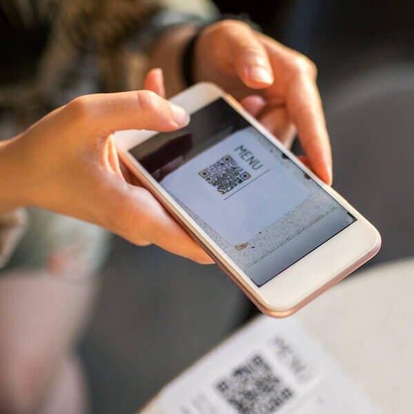 woman scanning a QR code