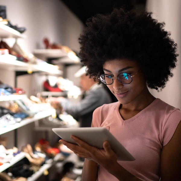 Woman working on the customer experience at a retail store