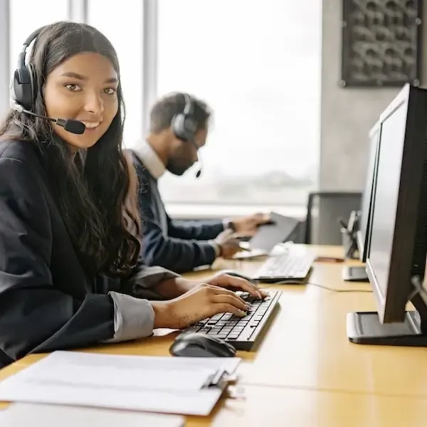 Call center agent smiling at work