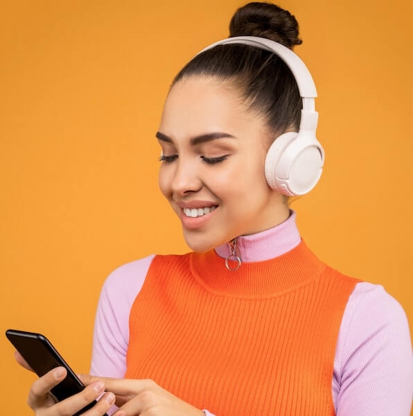 Customer smiling on phone because of up-sell