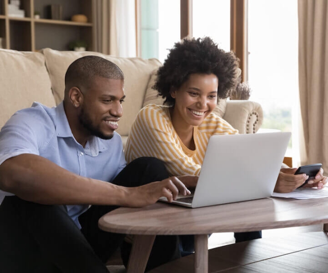 Man and woman reviewing benefits together
