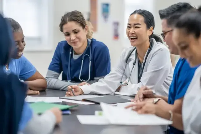 Doctors and nurses at a staff meeting