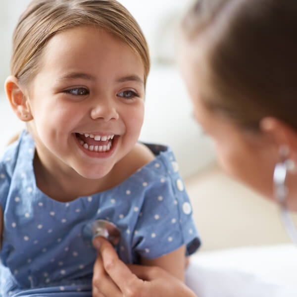 Patient smiling with doctor