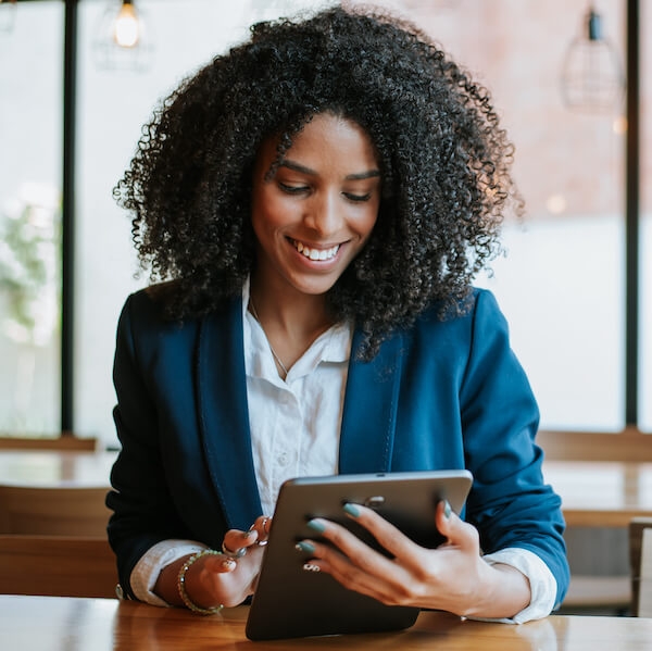 Woman smiling while doing quality management