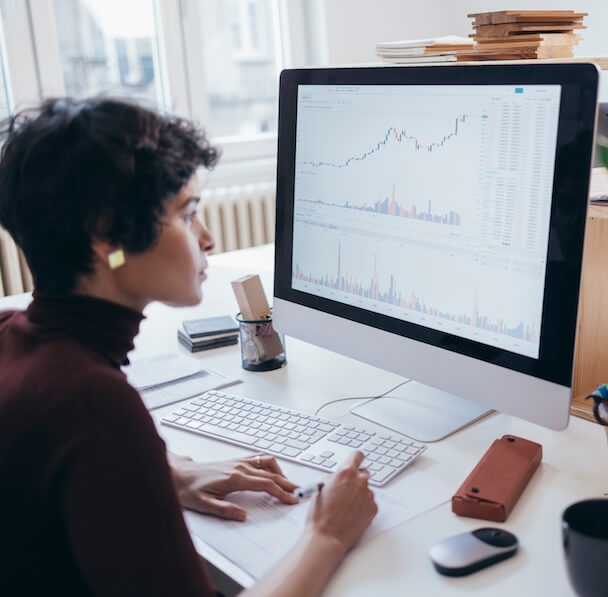 Woman working on statistical analysis software