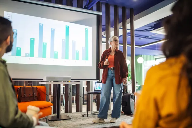 Woman presenting to group