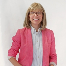 A professional headshot of Emma Sopadjieva