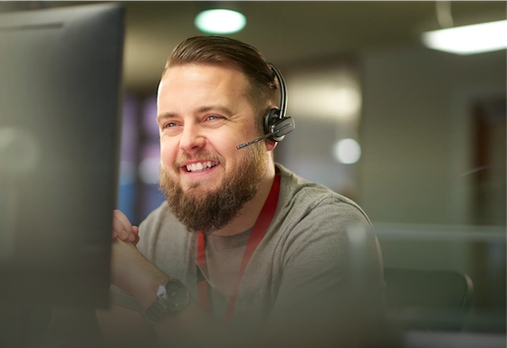 Service agent working with a headset on