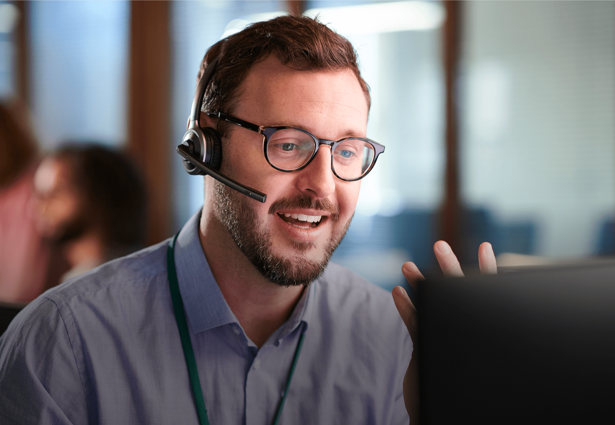 Employee talking with a customer.