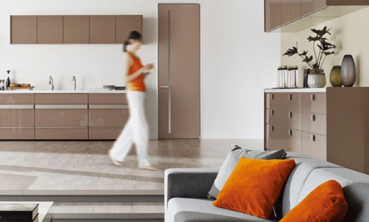 Woman walking through her house