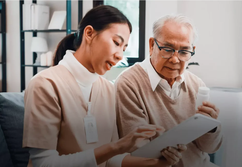 Nurse with clipboard talking to elderly patient.