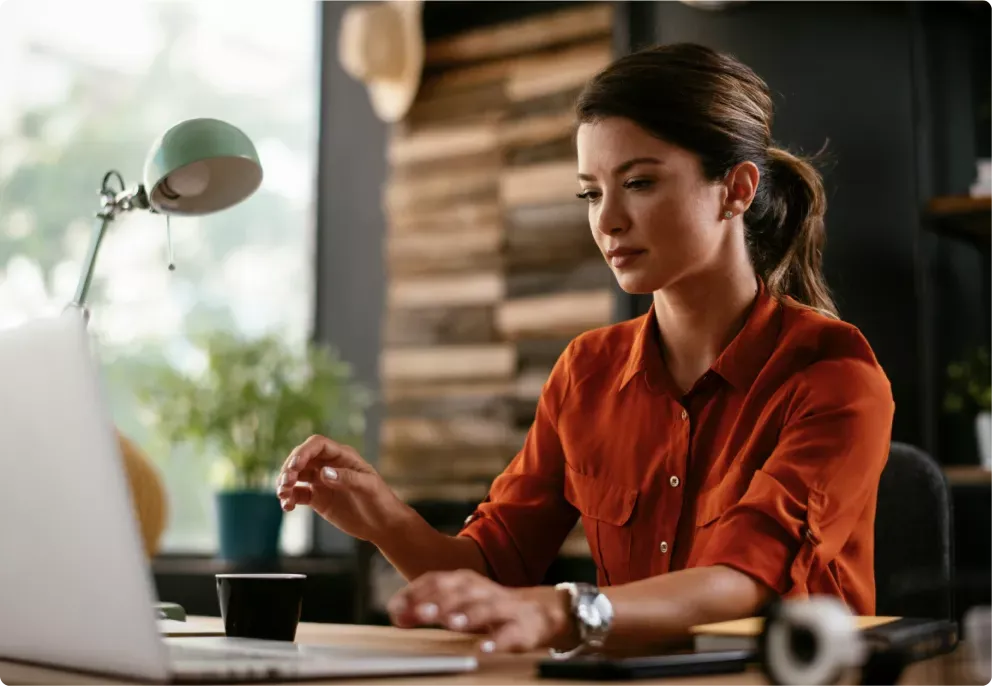 Financial services employee working on her computer