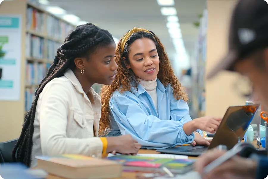 Higher education students collaborating on a project