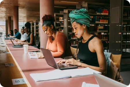 Women studying in the library