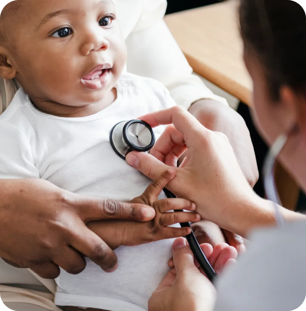 A baby being checked