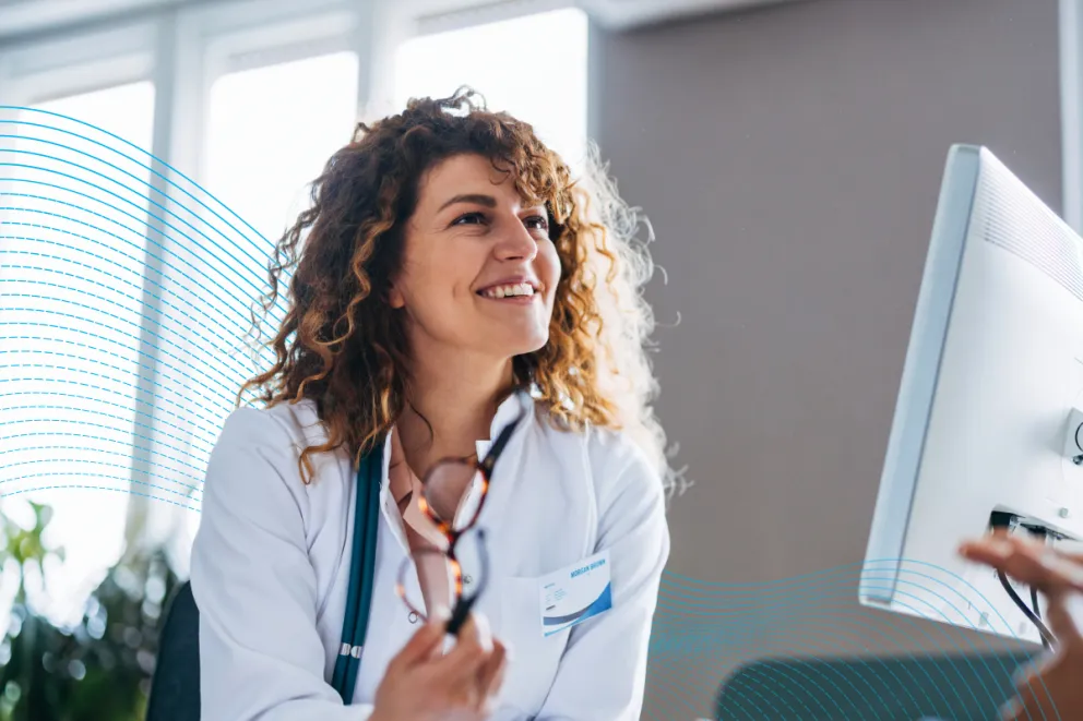 Healthcare professional speaking to a patient