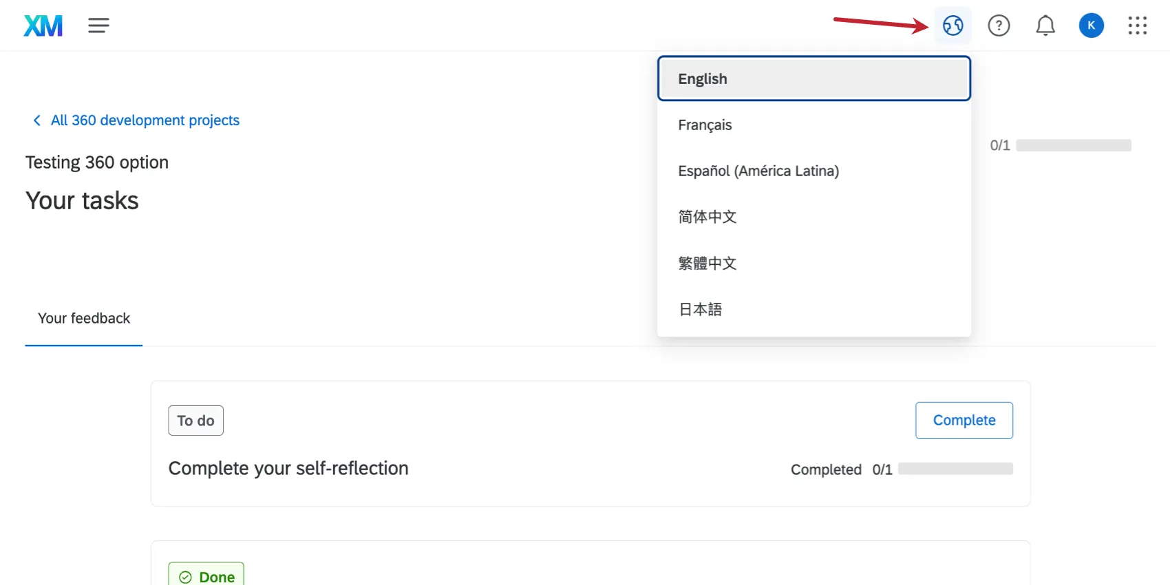 globe button expands to show language options